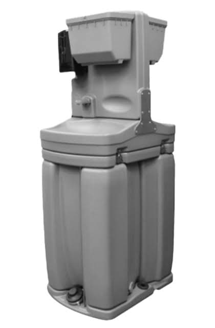 Grey outdoor portable handwashing station with integrated sink, soap dispenser, and foot-operated pump.